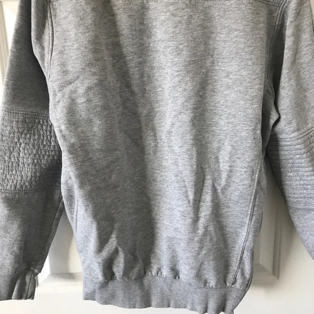 Divided cotton blend gray long sleeve sweater with side zippers